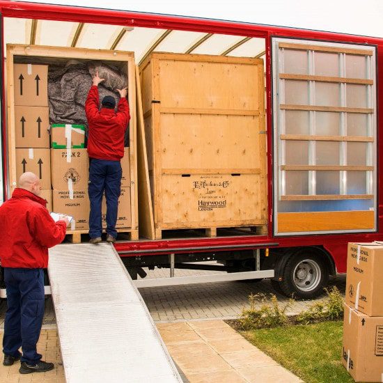 move team staff loading a lorry