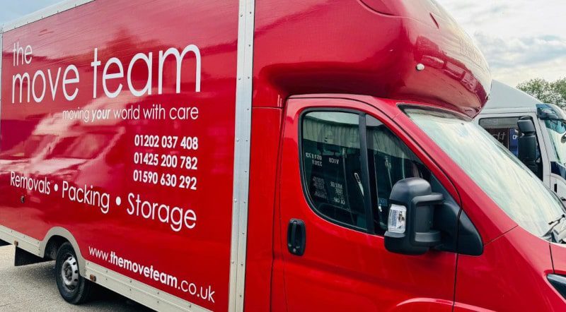 red branded move team van