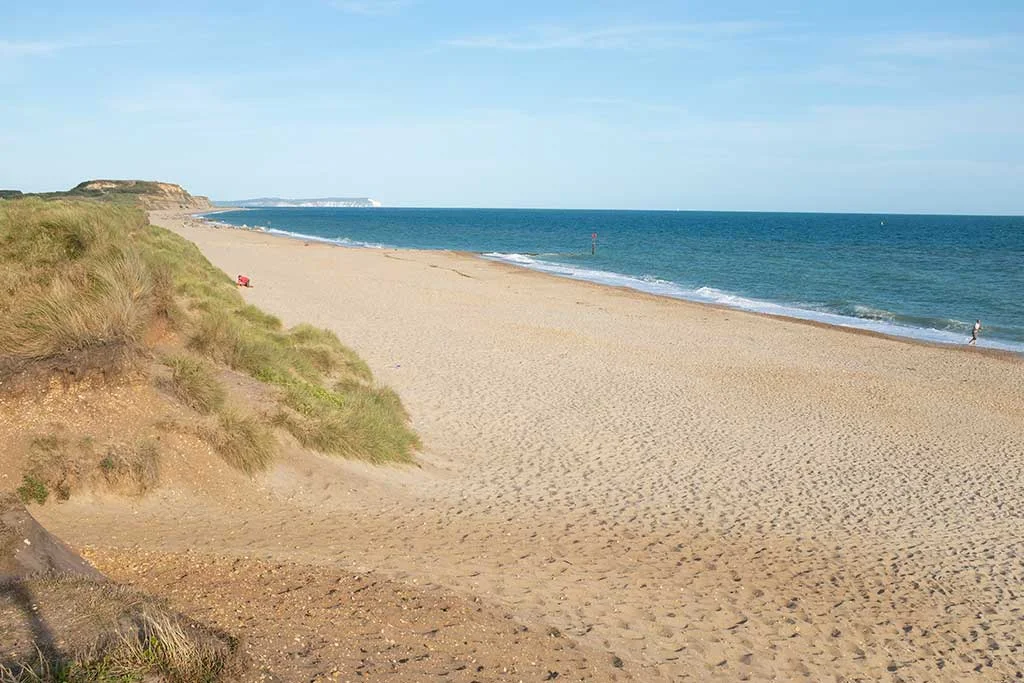 Golden sand and blue waters at Southbourne Beach Dorset for area relocation guide